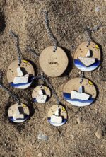 wooden pendants with sea tiles ship
