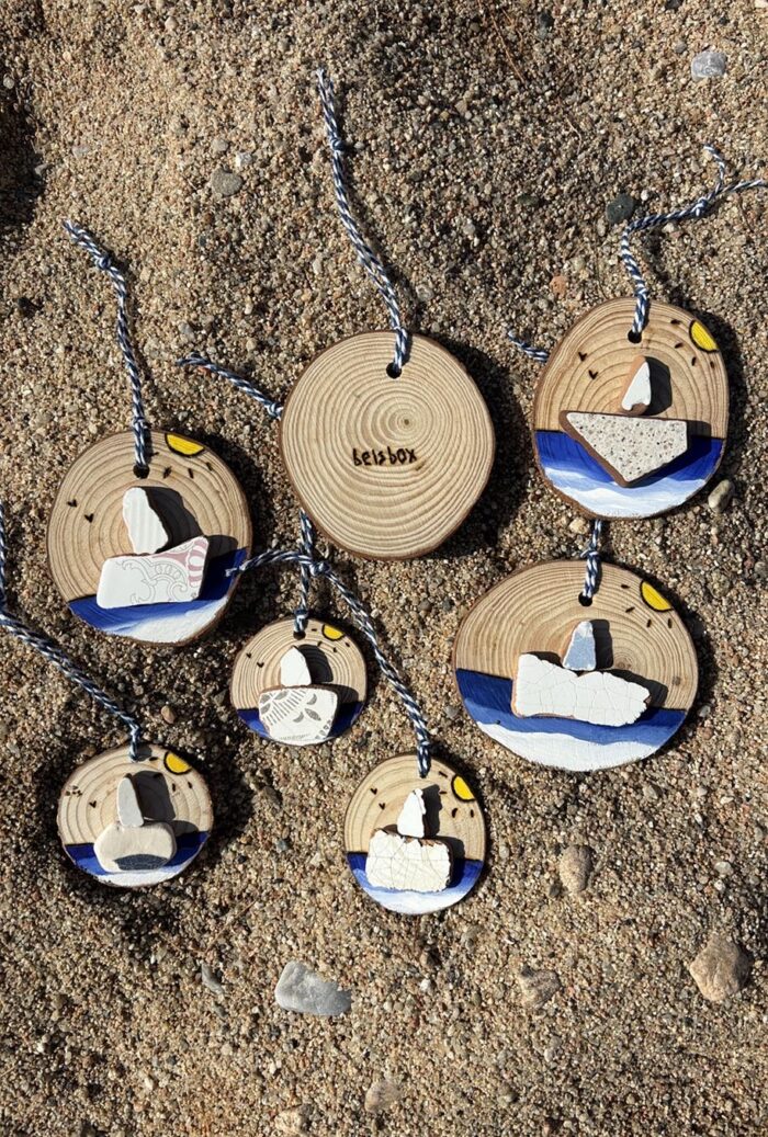 wooden pendants with sea tiles ship