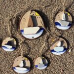wooden pendants with sea tiles ship
