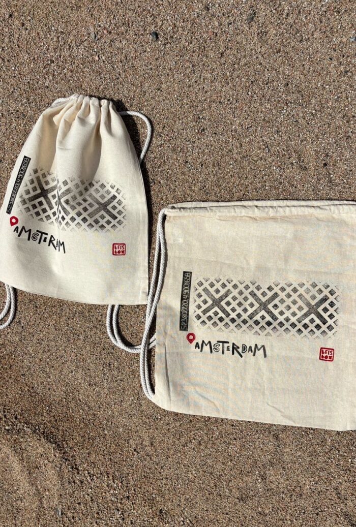 amsterdam manhole cover print backpack