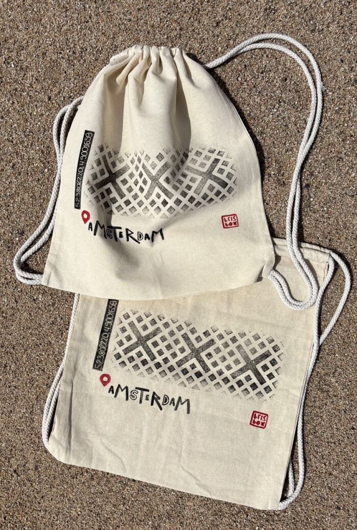 amsterdam manhole cover print backpack