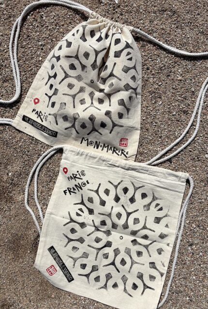 paris manhole cover on bags