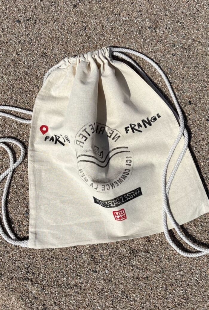 paris manhole cover print on backpack