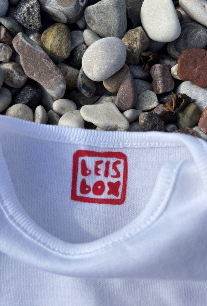 Car on chain linocut baby bodysuit