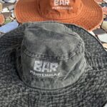 denim bucket hat bar montenegro with linocut print
