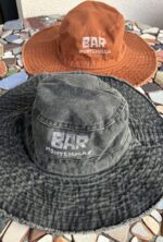 denim bucket hat bar montenegro with linocut print