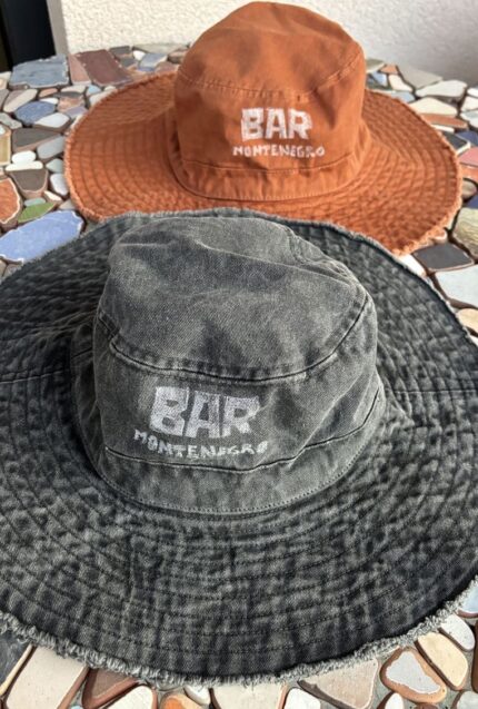 denim bucket hat bar montenegro with linocut print