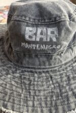 denim bucket hat bar montenegro with linocut print