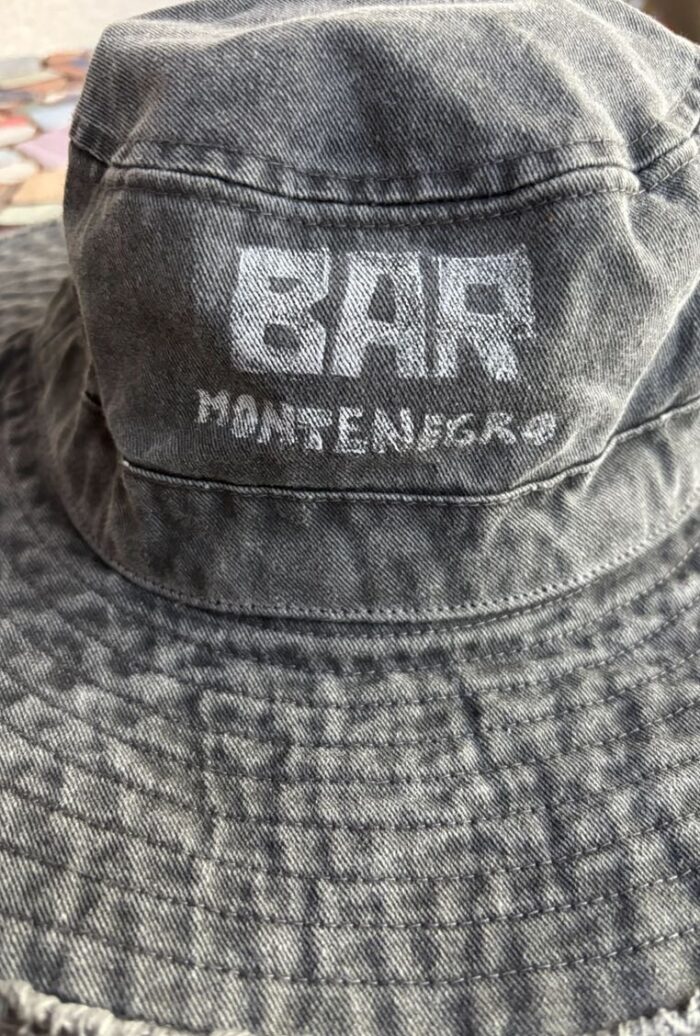 denim bucket hat bar montenegro with linocut print