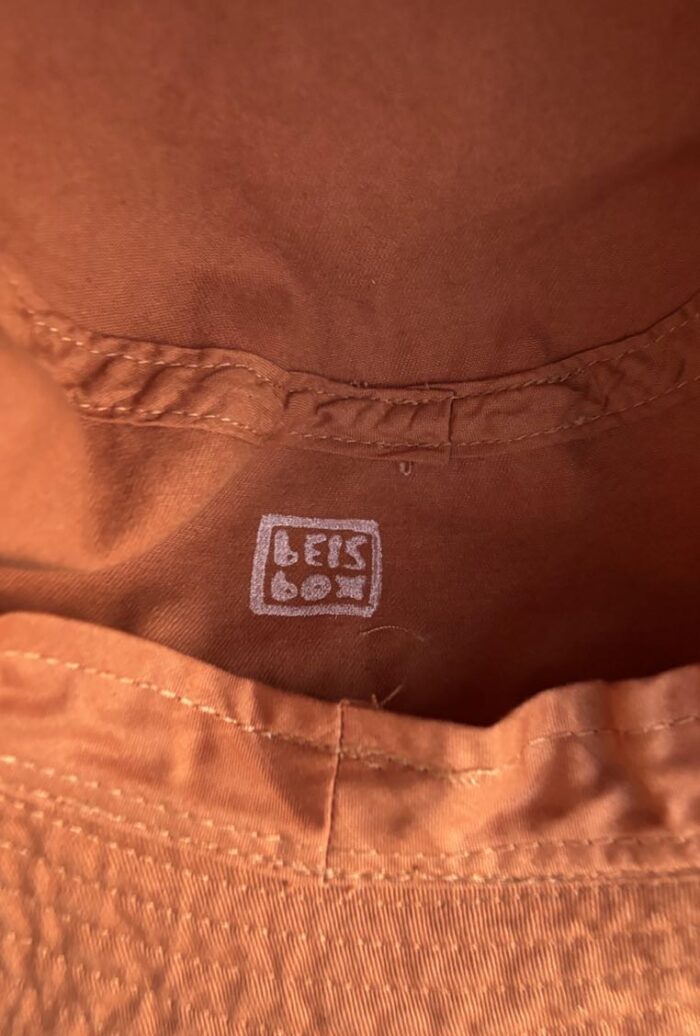 denim bucket hat bar montenegro with linocut print