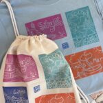 set: unisex t shirt & drawstring backpack with catalonia linoprints