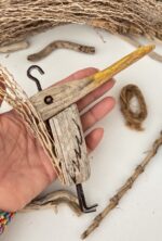driftwood bird with palm wood tail