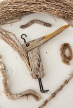 driftwood bird with palm wood tail