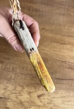 driftwood bird with palm wood tail
