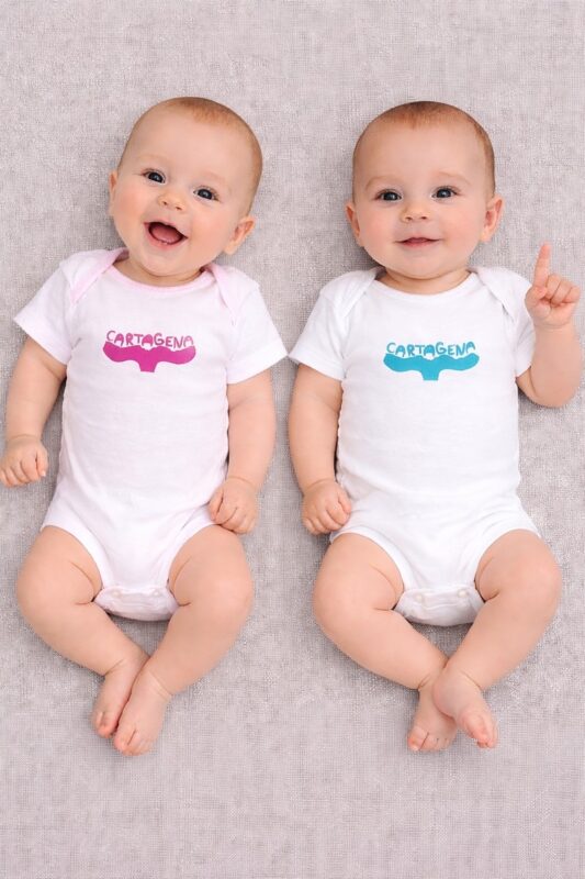 cartagena baby onesie — whale tail linoprint