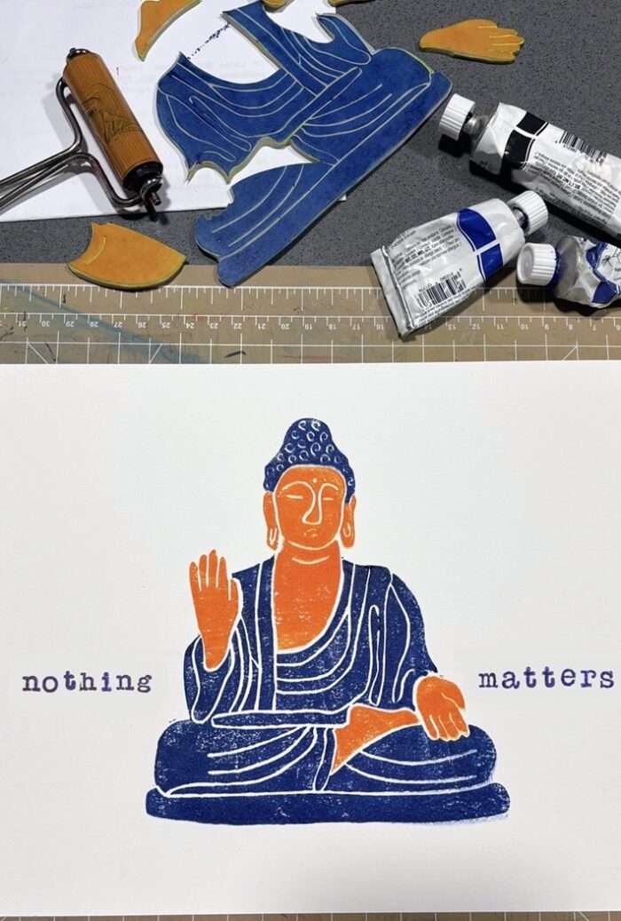 buddha linocut print with custom text on paper
