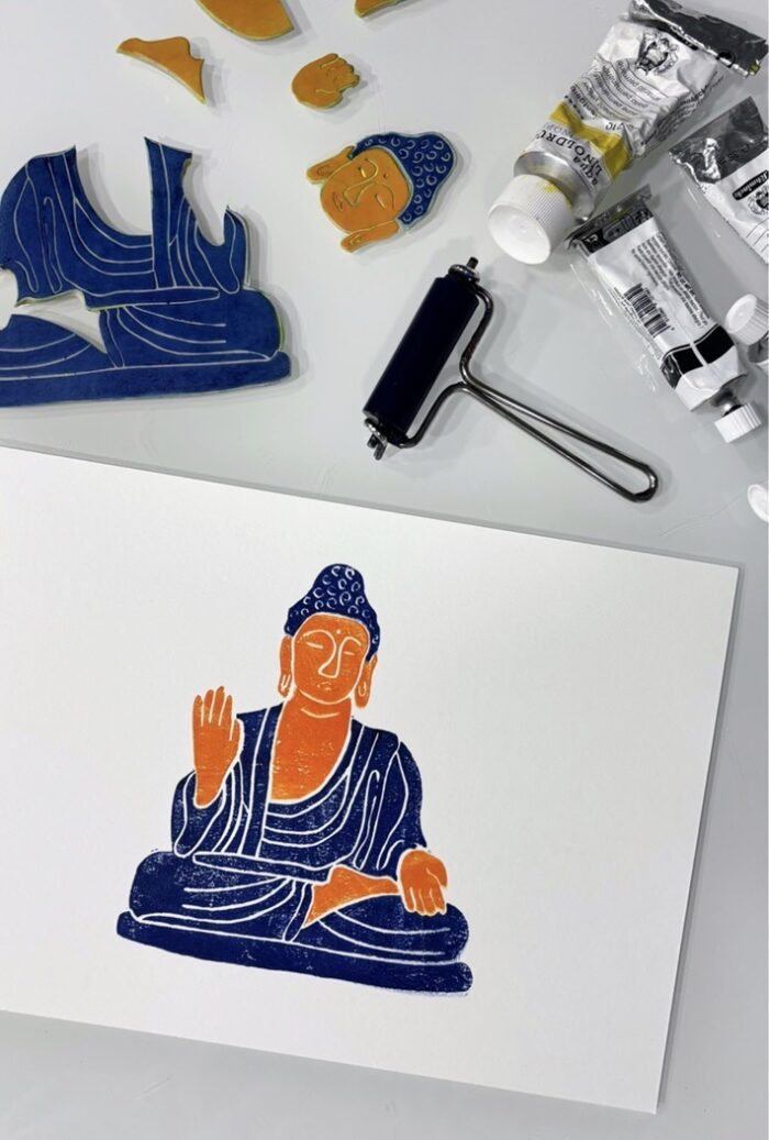 buddha linocut print with custom text on paper
