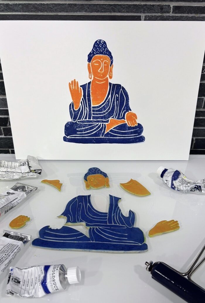 buddha linocut print with custom text on paper